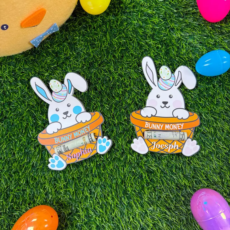 Personalized acrylic Easter bunny money holder on warm linen and stone.