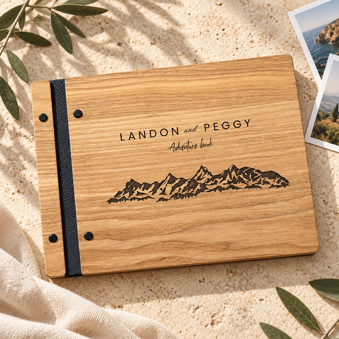 Light wood adventure guest book with mountain engraving on warm stone