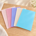 Acrylic sheets in peach, pink, lilac, beige and sky blue on pale oak