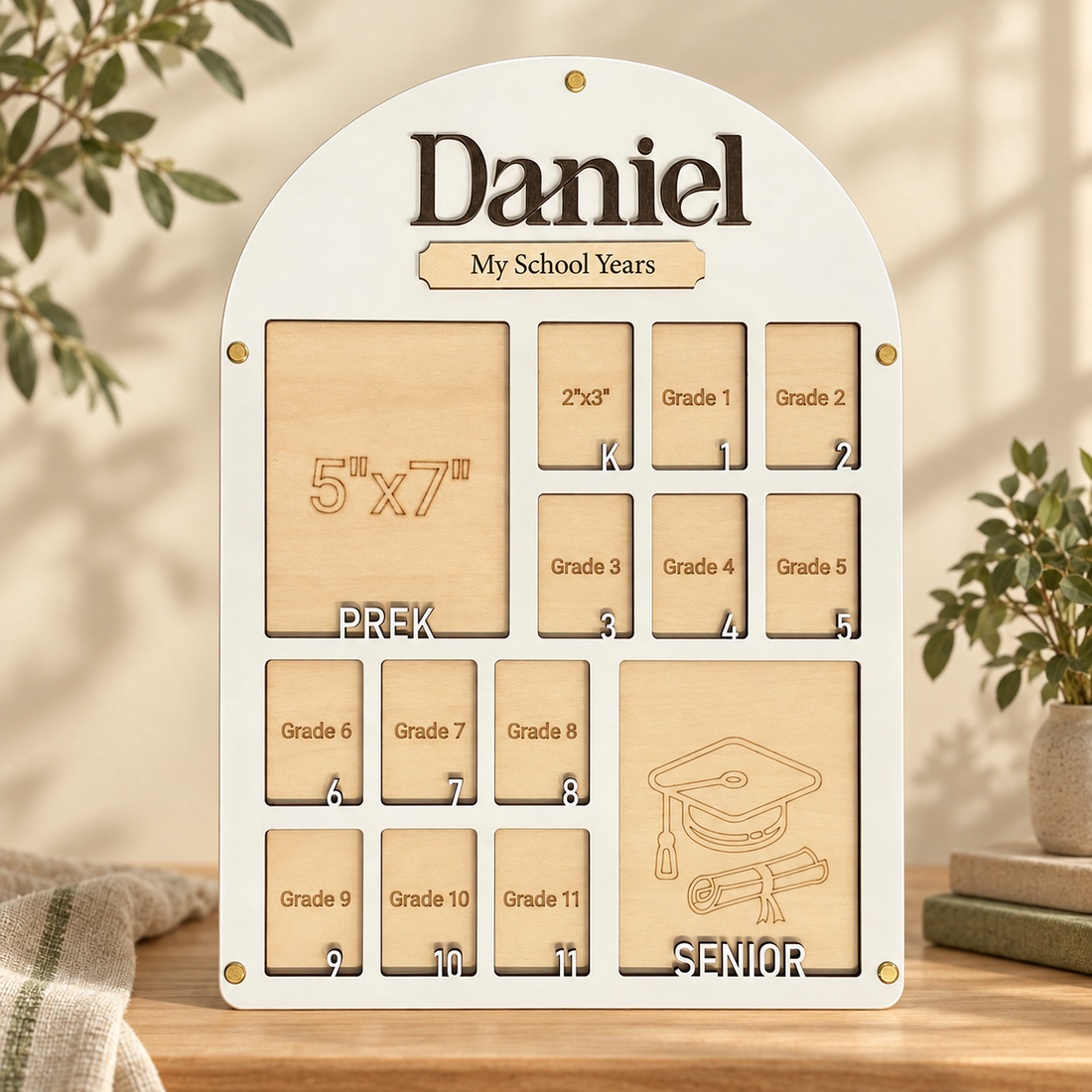 White arched Pre-K-to-Senior photo frame in a warm cream and sage setting