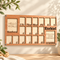 Natural wood newborn-to-graduation photo frame in a warm cream and sage setting