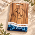 Rectangular acacia board with blue ocean-wave resin