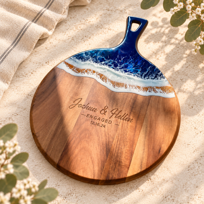 Round acacia board with ocean-wave resin
