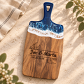Slim acacia serving board with blue ocean-wave resin