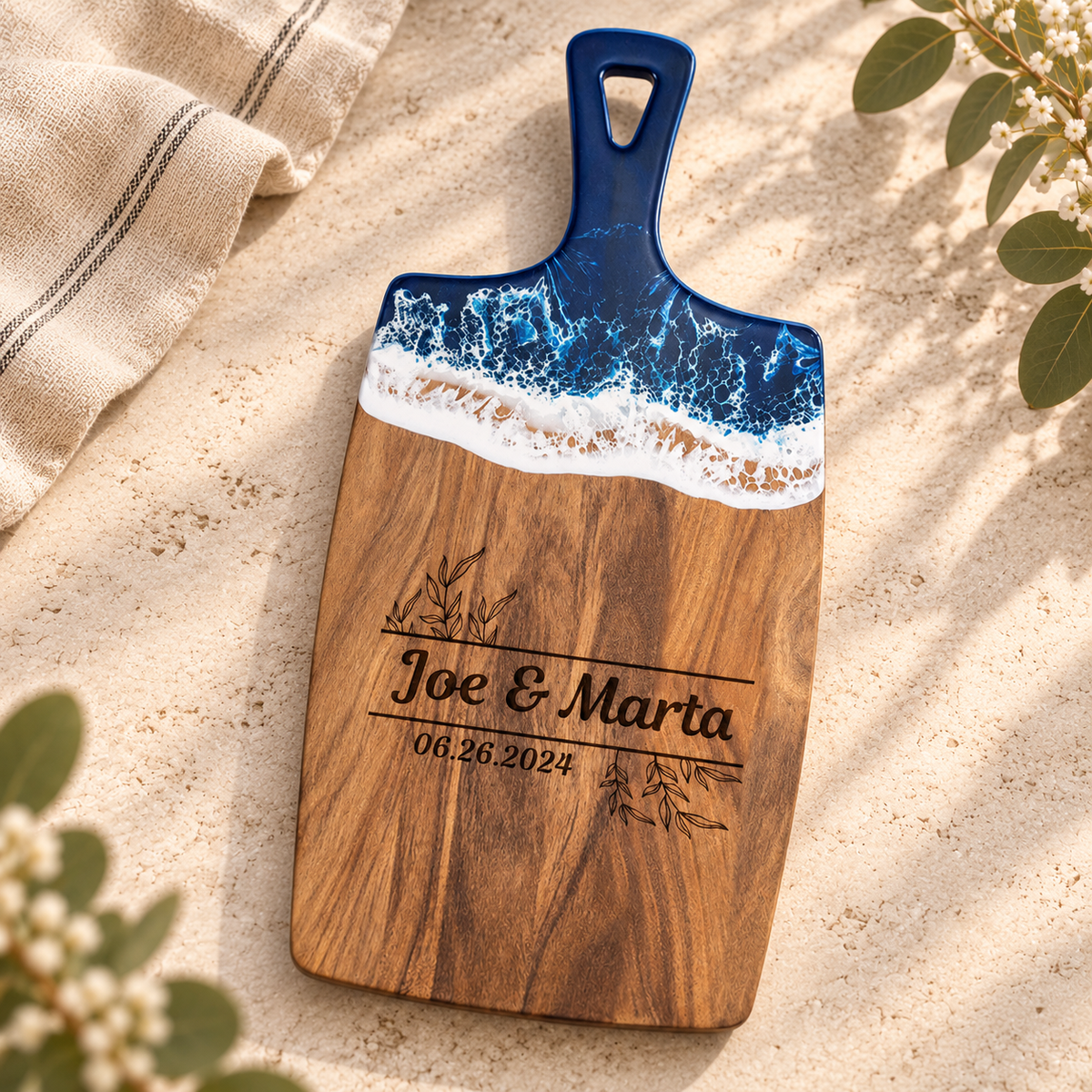 Slim acacia serving board with blue ocean-wave resin