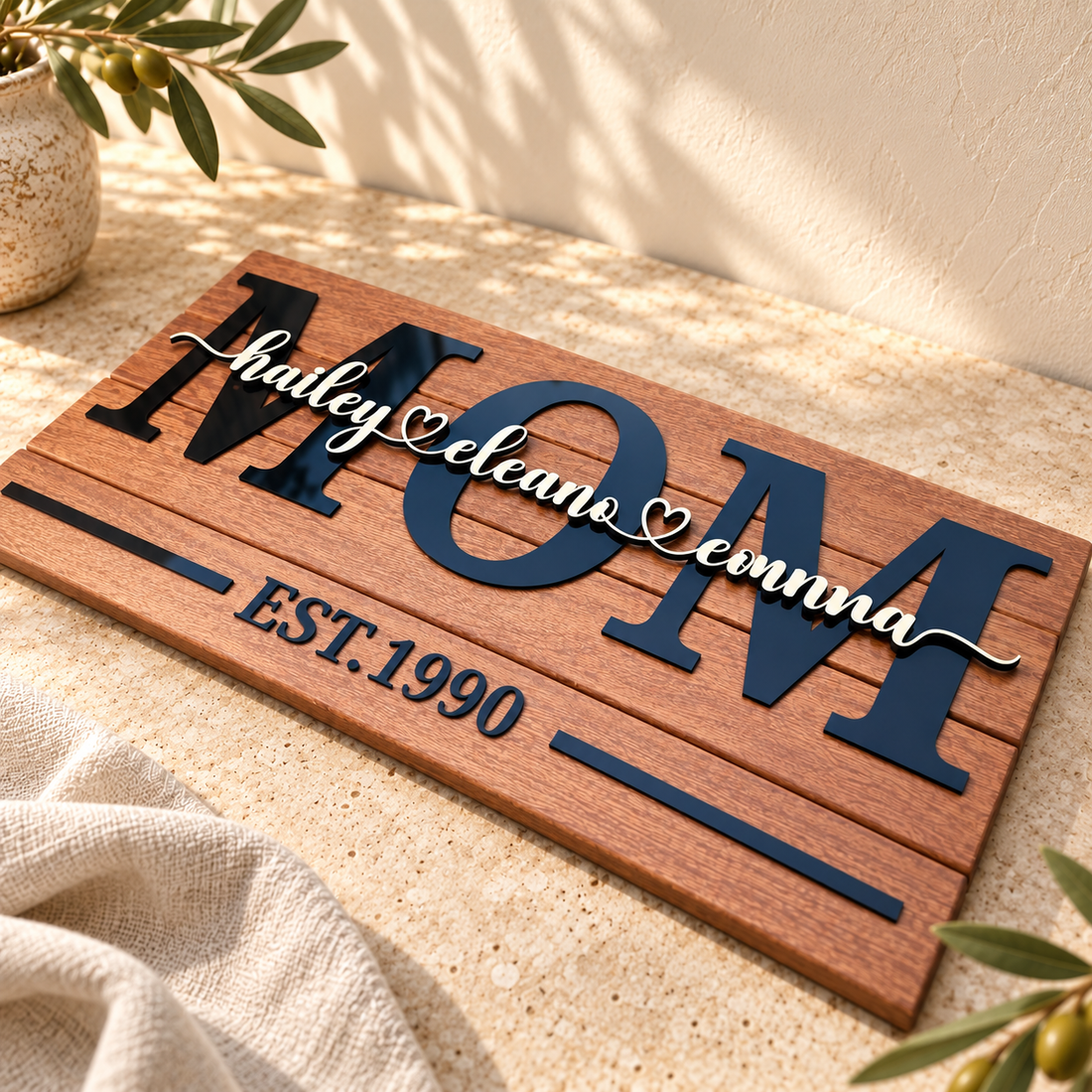 MOM family sign on warm stone