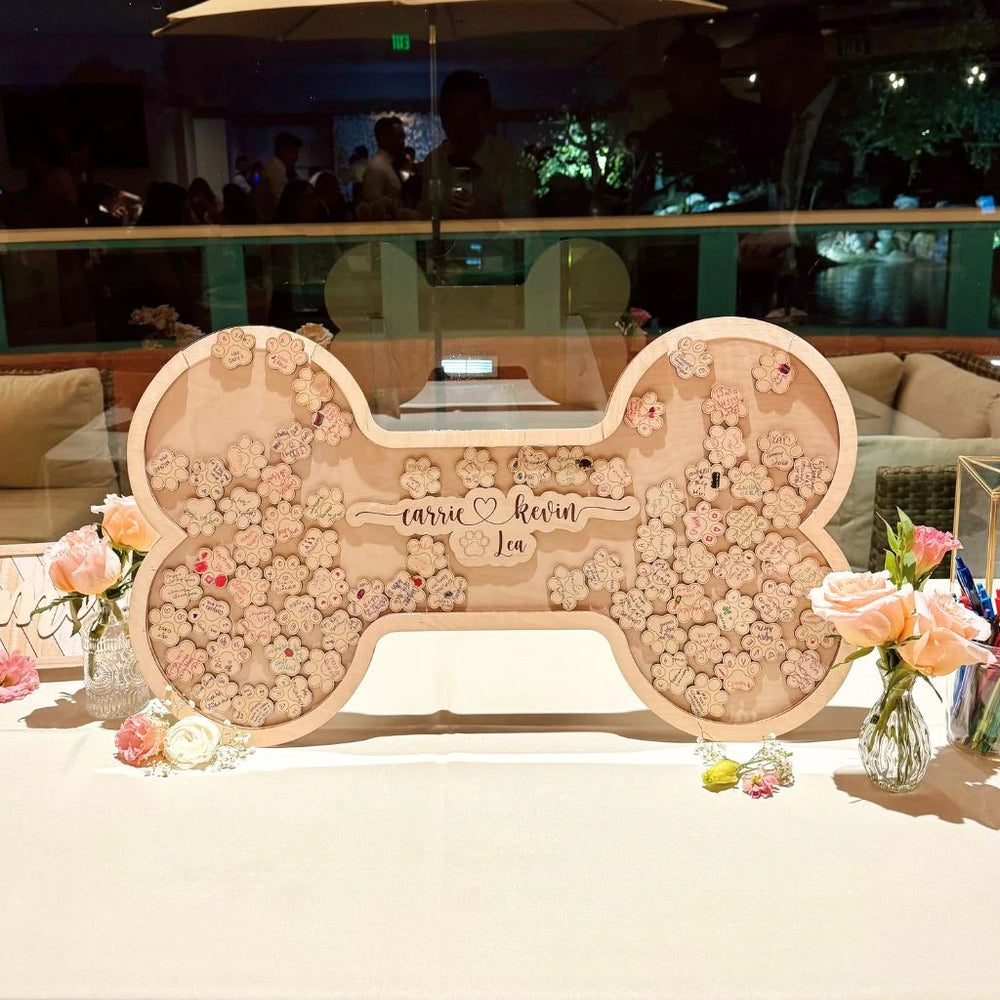 Personalized wooden guest book filled with signed pieces