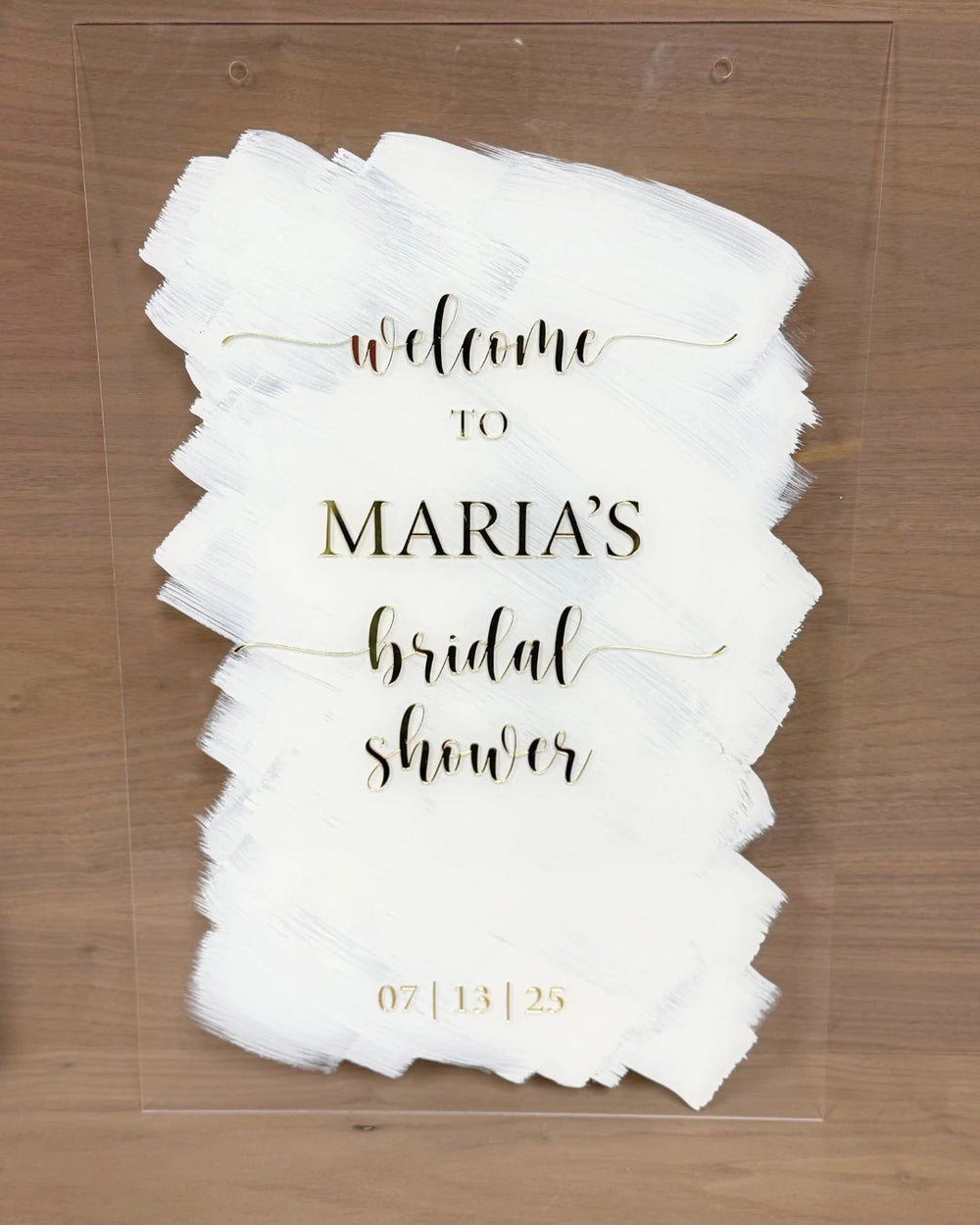 White and gold bridal shower welcome sign