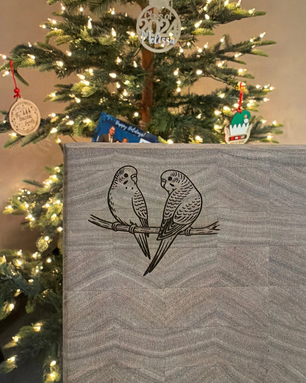 Engraved wooden book cover with birds