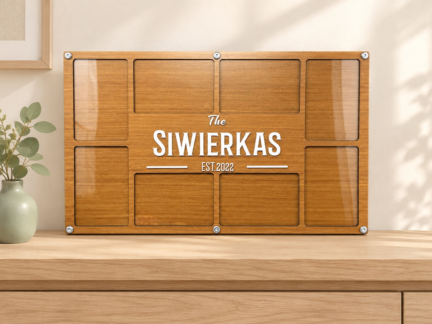 Personalized wooden family collage frame on a pale oak console