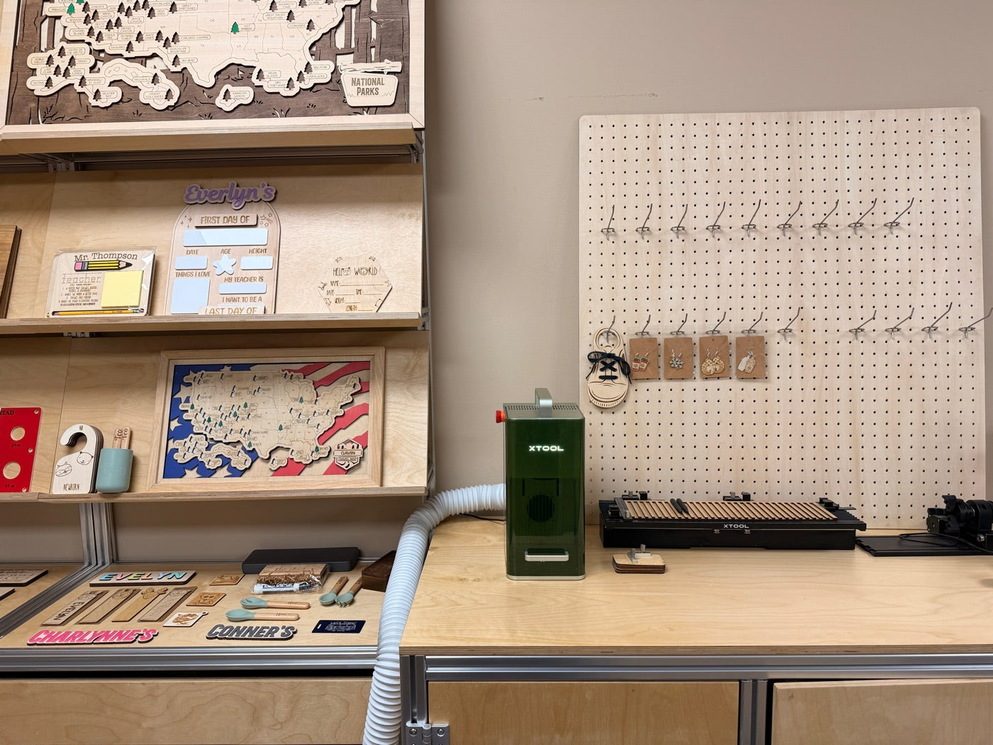 Craft Pilot’s display of personalized gifts beside an engraving station in the Chino Hills workshop.