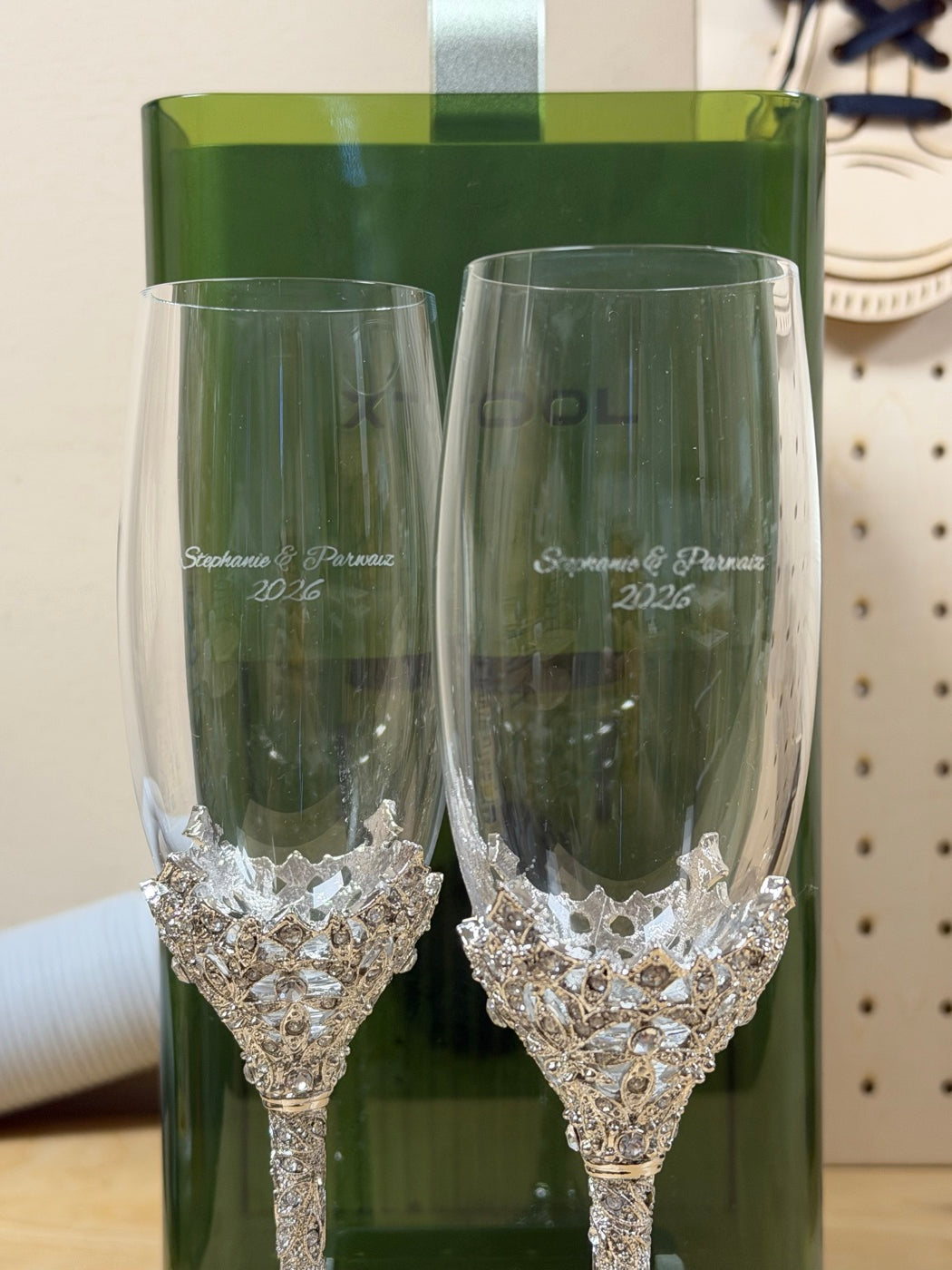 Engraved wedding champagne flutes with decorative stems
